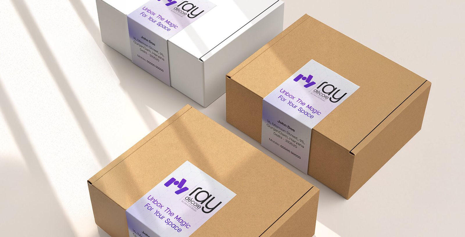 Ray Decore shipping boxes with Unbox the Magic labels