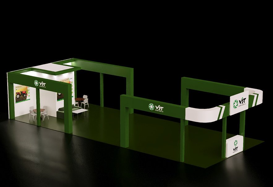 An open VST stall with a green gateway frame and a seating area beside a tractor display